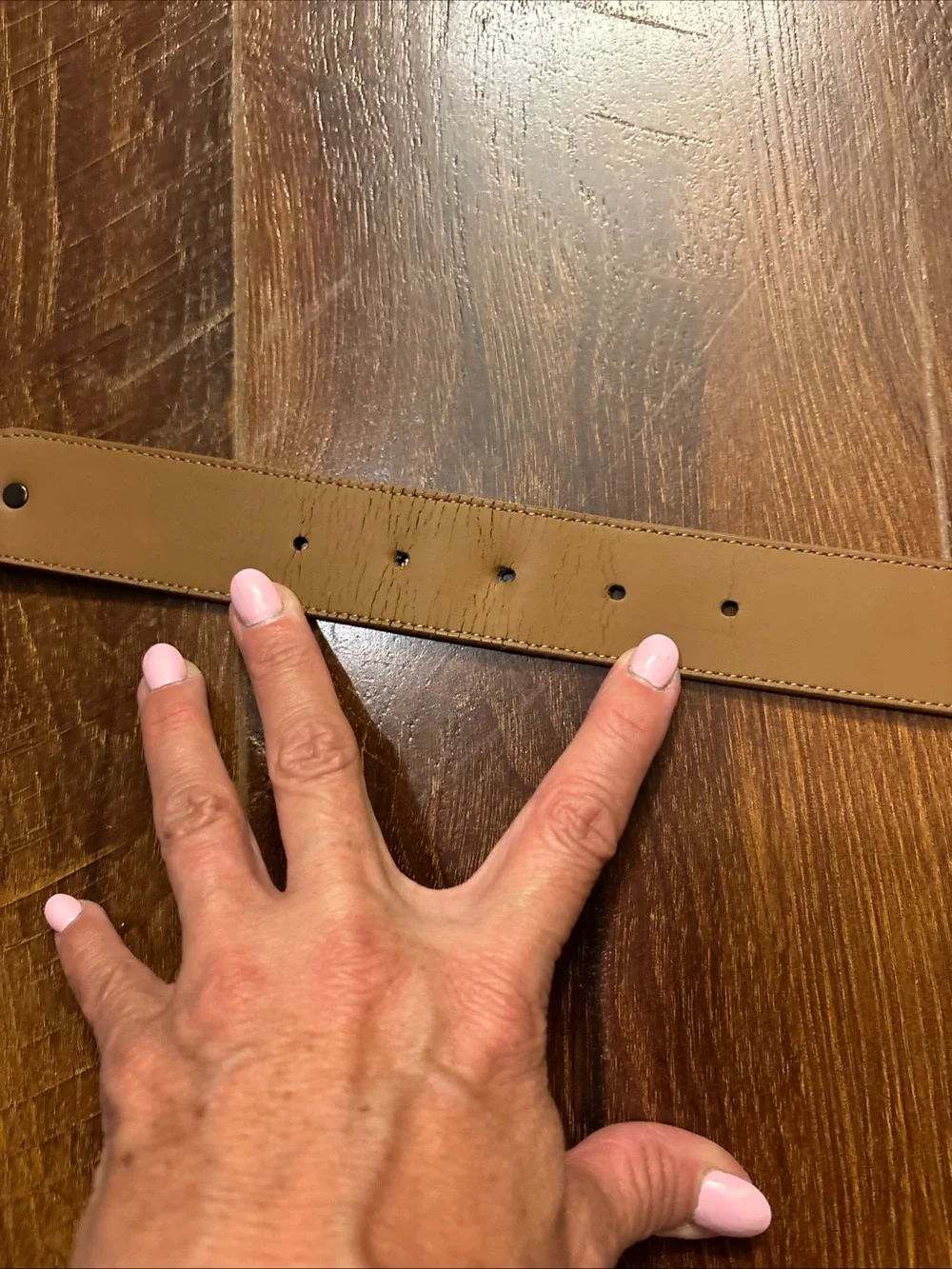 Tan Lacoste belt with textured weave pattern size 36